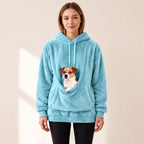 CuddleCarry pet carrier hoodie in Sky Blue with a small dog peeking out of the front pouch
